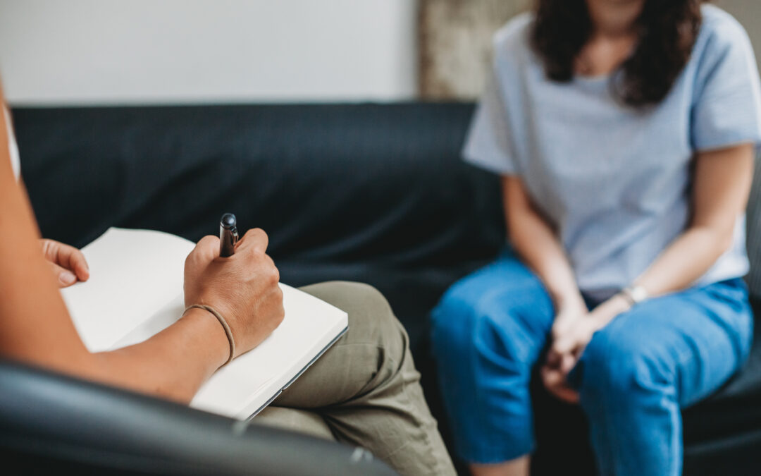 Psychotherapy session, woman talking to his psychologist in the
