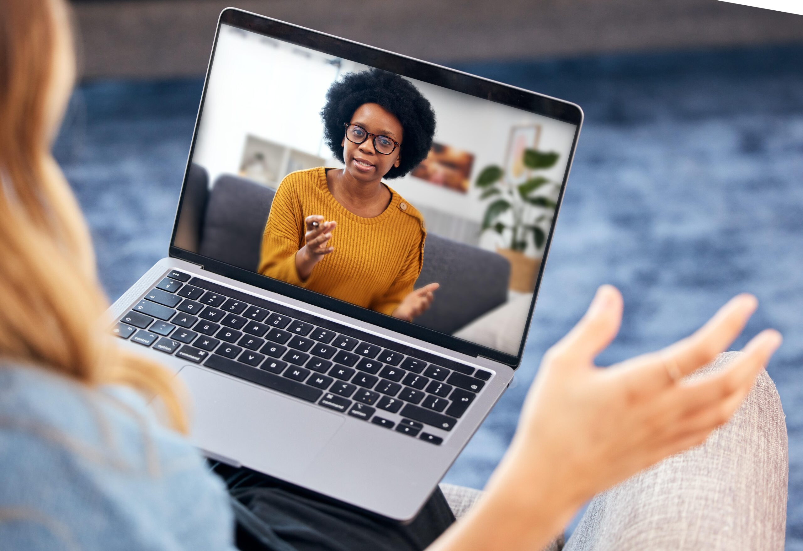 Woman, video call and psychologist on laptop screen of support, advice or helping with mental health in online meeting. African therapist talking to home client for remote therapy on computer Woman, video call and psychologist on laptop screen of support, advice or helping with mental health in online meeting. African therapist talking to home client for remote therapy on computer